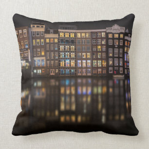 Amsterdam houses with colourful lights in the throw pillow