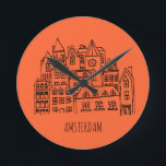 Amsterdam Netherlands Holland City Souvenir Orange Round Clock<br><div class="desc">Amsterdam is the capital and most populous municipality of the Kingdom of the Netherlands. Best souvenirs from the city as a gift. Holland attracks a lot of tourists every year. Have you not visited the beautiful city Amsterdam yet. Perfect gifts for Amsterdam,  Holland.</div>