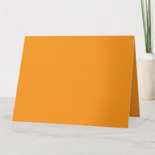 An abstract blend of vibrant orange, red, and yell card