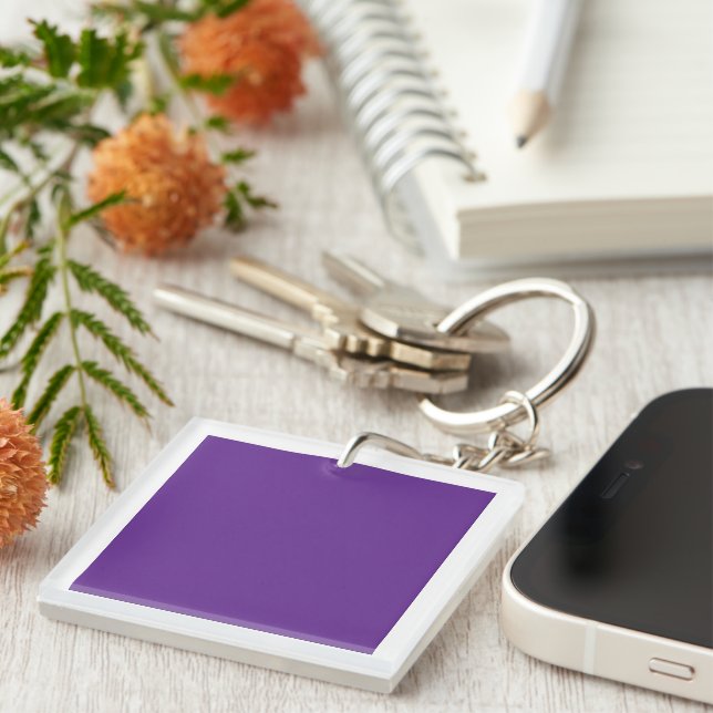 An abstract blend of vibrant purple and pink hues  keychain (Front Right)