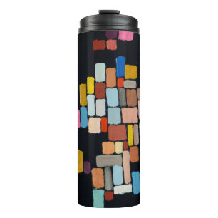An abstract painting; geometric shapes in an irreg thermal tumbler