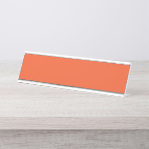 An abstract pattern of swirling, vibrant colors wi desk name plate