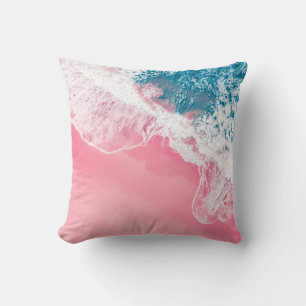 An aerial view of a pink sandy beach in New South Throw Pillow