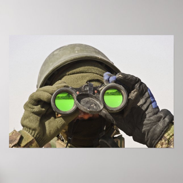 An Afghan soldier scans the horizon Poster (Front)