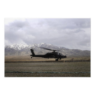 An AH-64A Apache taking off Photo Print