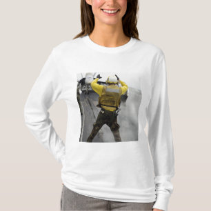 An aircraft director signals a F/A-18C Hornet T-Shirt