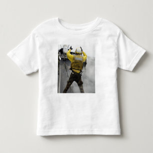 An aircraft director signals a F/A-18C Hornet Toddler T-shirt