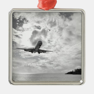 An airliner comes in for a landing at Princess Metal Ornament