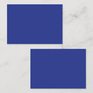 an airplane flying in the sky place card