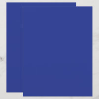 an airplane flying in the sky with a blue backgrou