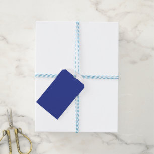 an airplane flying in the sky with a blue backgrou gift tags