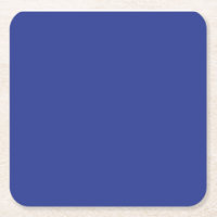 an airplane flying in the sky with a blue backgrou