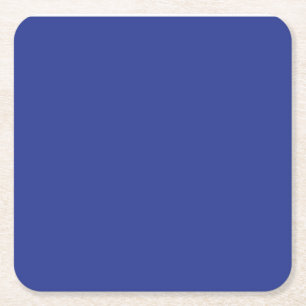 an airplane flying in the sky with a blue backgrou square paper coaster