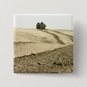 An amphibious assault vehicle 2 inch square button