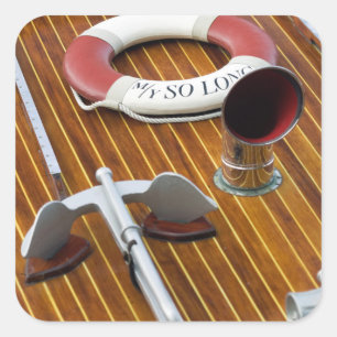 An Anchor And A Life-Buoy On A Wooden Boat Square Sticker