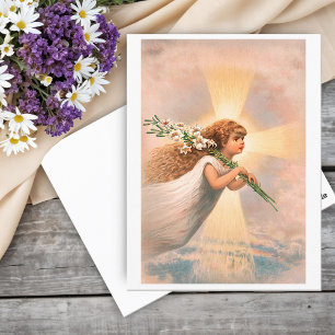 An angel in the sky holding lilies on her shoulder postcard