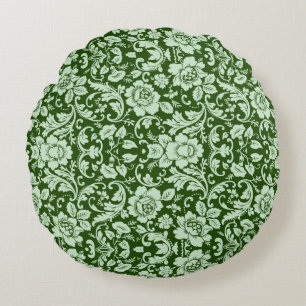 An antique floral damask round pillow