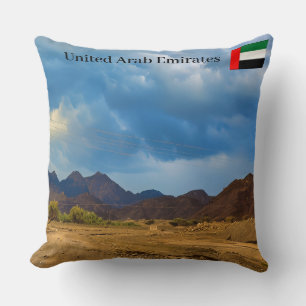 An arid landscape under a dramatic, cloudy sky throw pillow