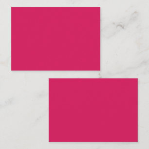 An array of red and pink flowers with lush green l appointment card