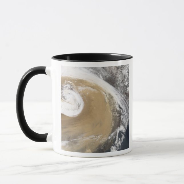 An Asian dust storm crosses the Pacific Mug (Left)