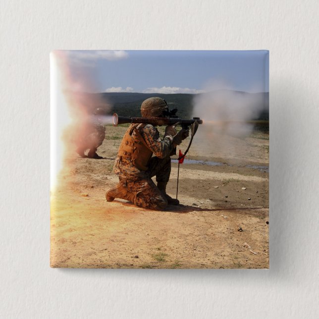 An assaultman fires a Rocket Propelled Grenade 2 Inch Square Button (Front)