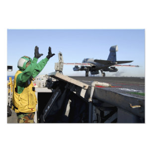 An EA-6B Prowler launches from the flight deck Photo Print