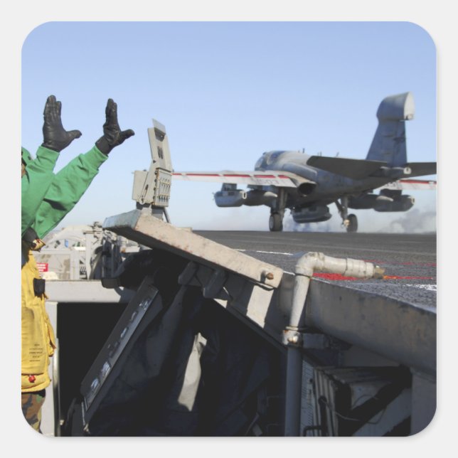 An EA-6B Prowler launches from the flight deck Square Sticker (Front)
