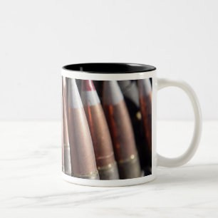An even mix of four ball rounds to one tracer Two-Tone coffee mug