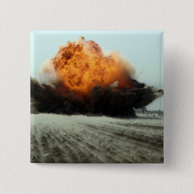 An explosion erupts 2 inch square button (Front)