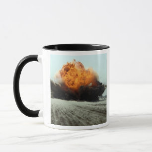 An explosion erupts mug