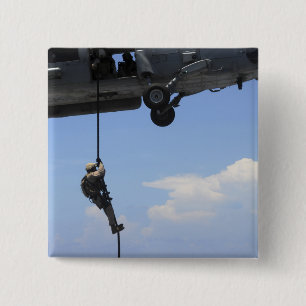 An explosive ordinance disposal technician 2 inch square button