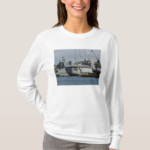 An F-15 Eagle gets a lift from a barge crane T-Shirt