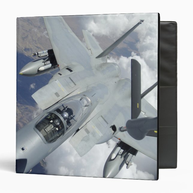 An F-15 Eagle pulls away from a KC-135 Binder (Front/Inside)