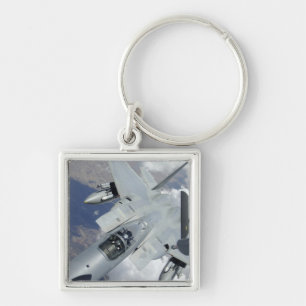An F-15 Eagle pulls away from a KC-135 Keychain