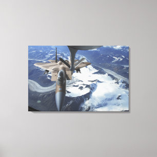 An F-15C Eagle aircraft sits behind a KC-135R Canvas Print