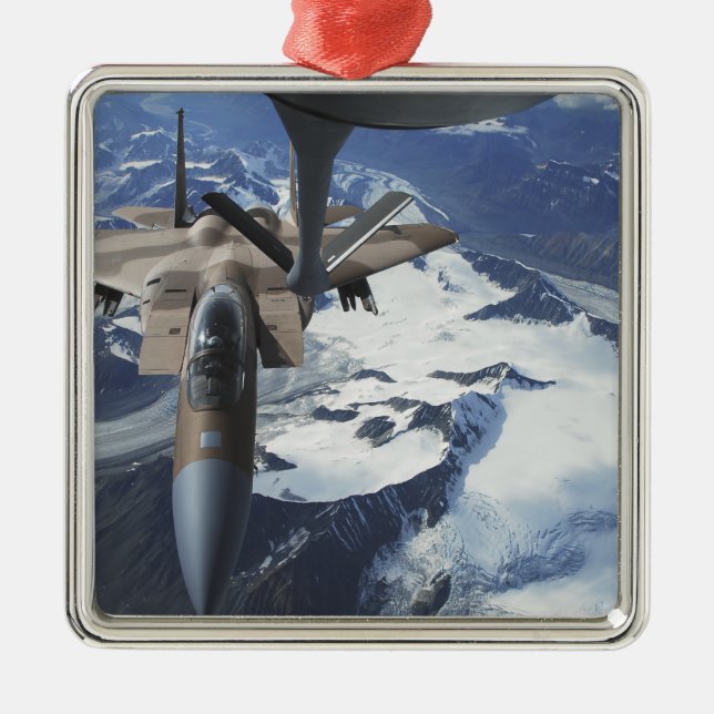 An F-15C Eagle aircraft sits behind a KC-135R Metal Ornament (Front)