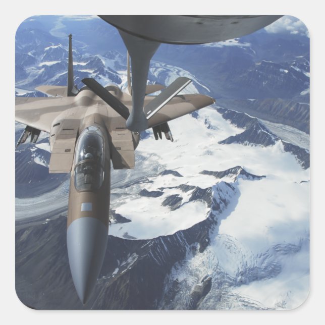 An F-15C Eagle aircraft sits behind a KC-135R Square Sticker (Front)