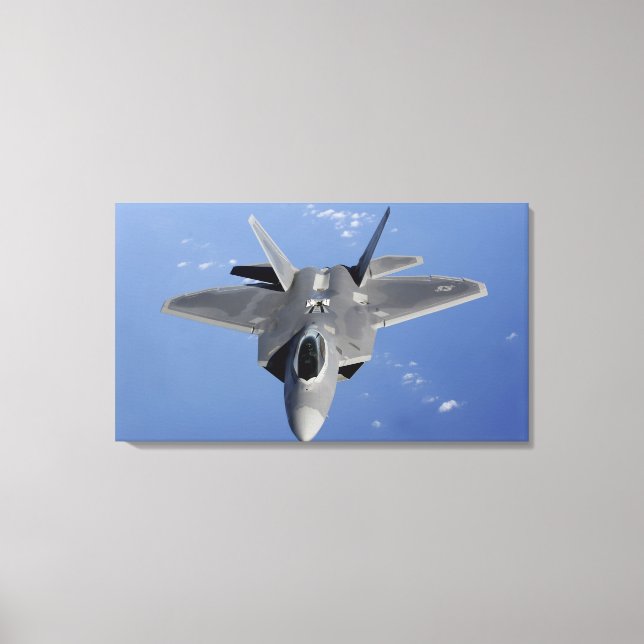 An F-22 Raptor moves into position to receive f 2 Canvas Print (Front)