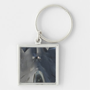 An F-22 Raptor moves into position to receive f Keychain
