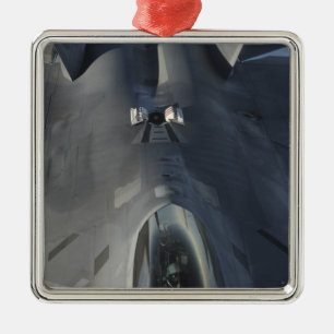 An F-22 Raptor moves into position to receive f Metal Ornament