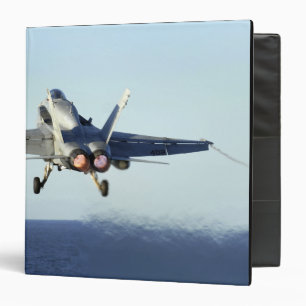 An F/A-18C Hornet launches from the flight deck Binder