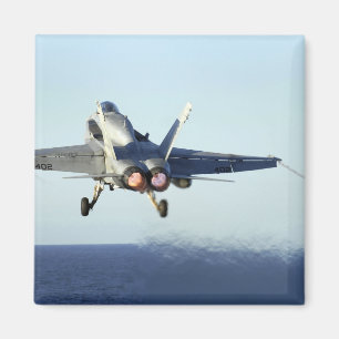 An F/A-18C Hornet launches from the flight deck Magnet