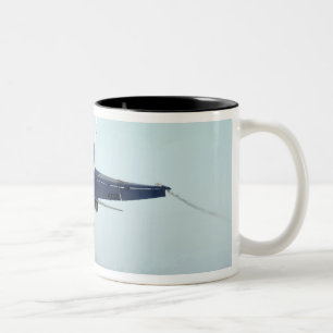 An F/A-18C Hornet launches from the flight deck Two-Tone Coffee Mug