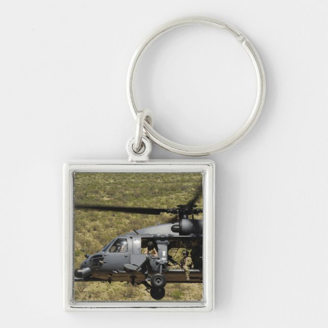 An HH-60 Pave Hawk flies over the desert Keychain (Front)