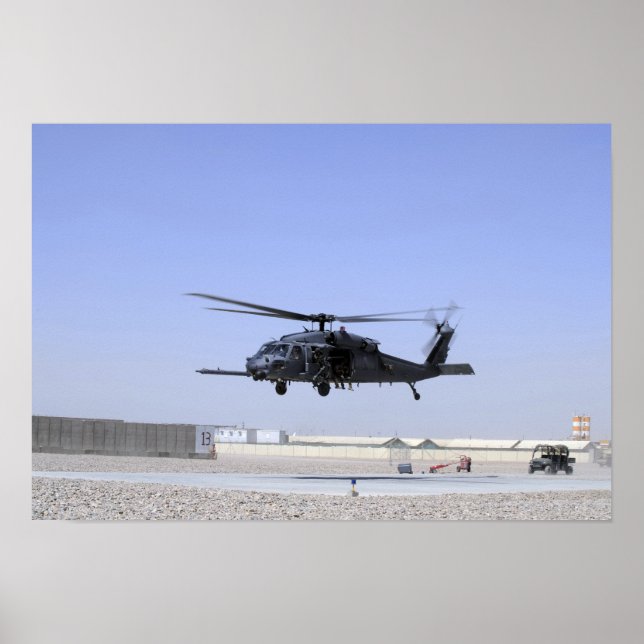 An HH-60G Pave Hawk taking off from Camp Bastio Poster (Front)