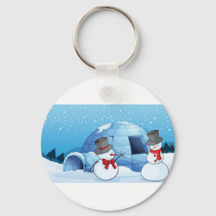 an igloo and snowmen keychain