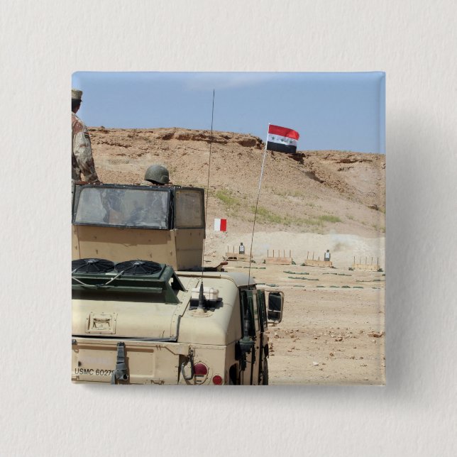 An instructor watches as an Iraqi army soldier 2 Inch Square Button (Front)