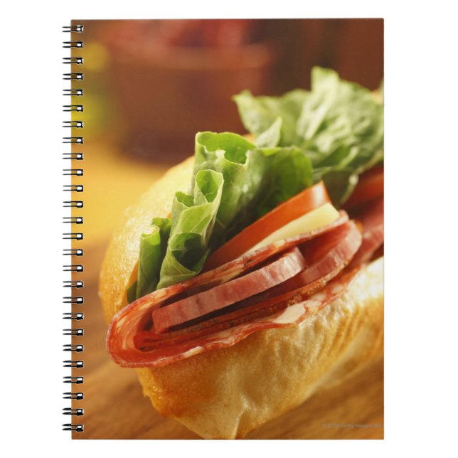 An Italian sub sandwich with Notebook (Front)