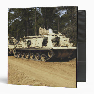 An M-88 recovery vehicle begins to tow an M992 Binder