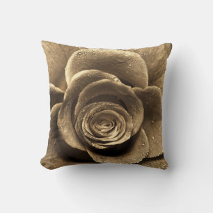 An old-fashioned rose close up, wet with water dro throw pillow